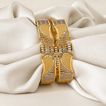 CYGNI Gold Tone Leaf Motif Bangles with White Detailing | Set of 2